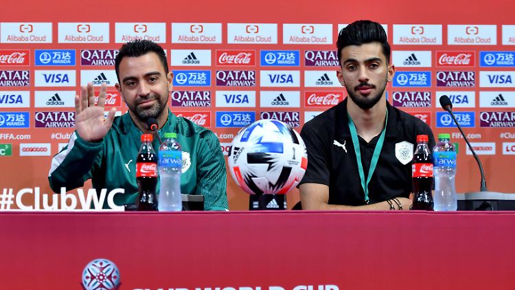Xavi Hernandez (l.) in Katar. 