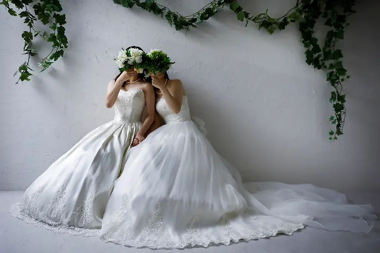 2024-07-08T230044Z-577738314-RC2L94AFJZWG-RTRMADP-3-JAPAN-LGBT-WEDDINGS