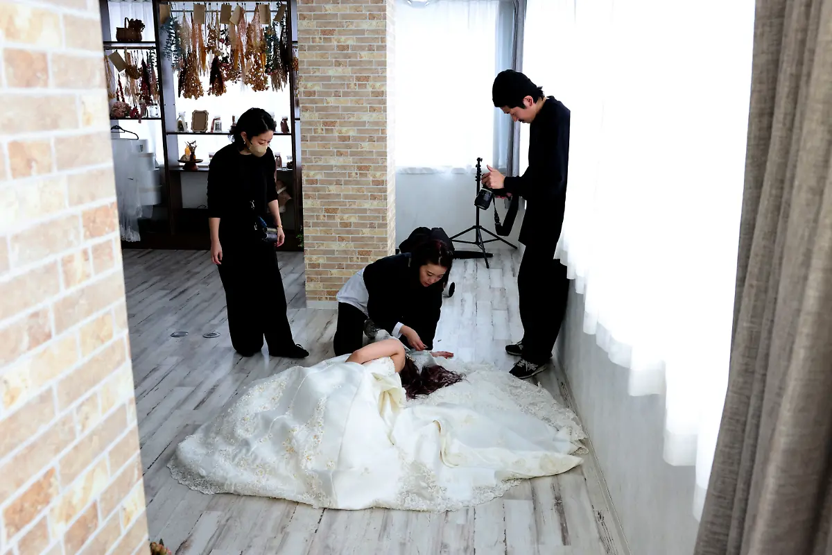 2024-07-08T230054Z-1724068202-RC26U6ACGJNT-RTRMADP-3-JAPAN-LGBT-WEDDINGS