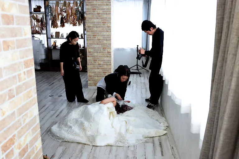 2024-07-08T230054Z-1724068202-RC26U6ACGJNT-RTRMADP-3-JAPAN-LGBT-WEDDINGS