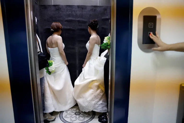 2024-07-08T230103Z-1116378909-RC2644AUFE5T-RTRMADP-3-JAPAN-LGBT-WEDDINGS