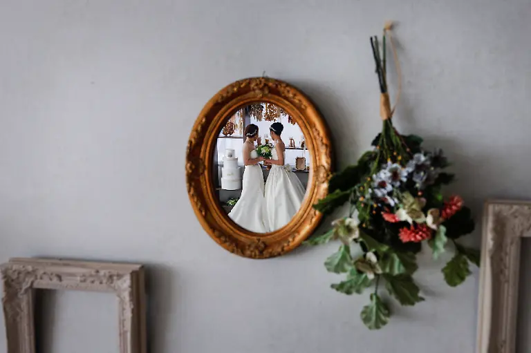 2024-07-08T230046Z-1780337636-RC2544AQL6PP-RTRMADP-3-JAPAN-LGBT-WEDDINGS