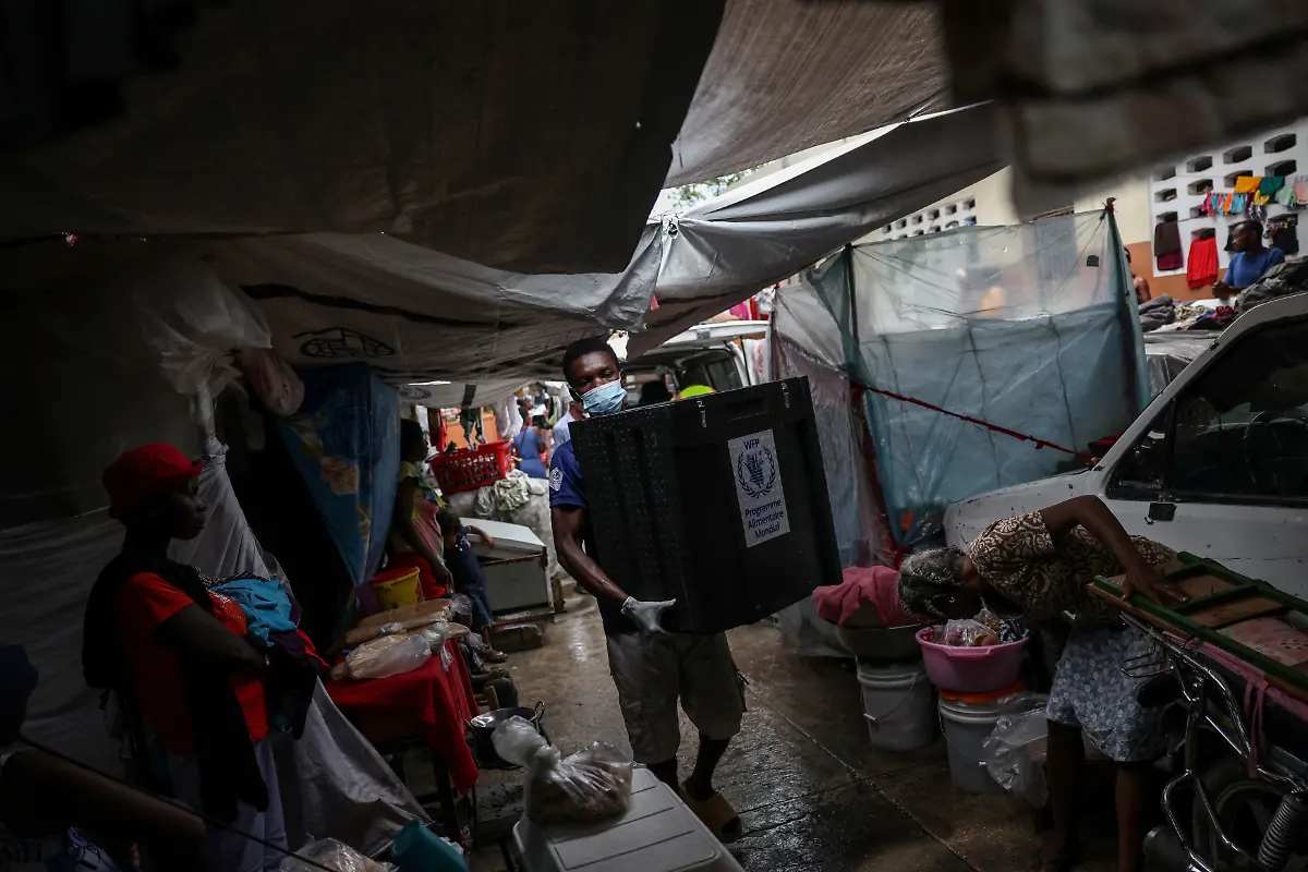 2024-07-03T130118Z-1520347145-RC25J7AZQC7S-RTRMADP-3-HAITI-VIOLENCE-HUNGER