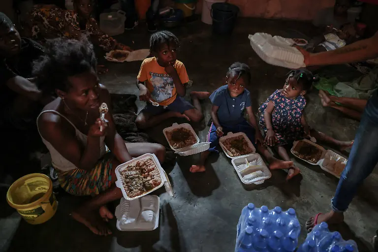 2024-07-03T130039Z-551833189-RC26J7AA421N-RTRMADP-3-HAITI-VIOLENCE-HUNGER