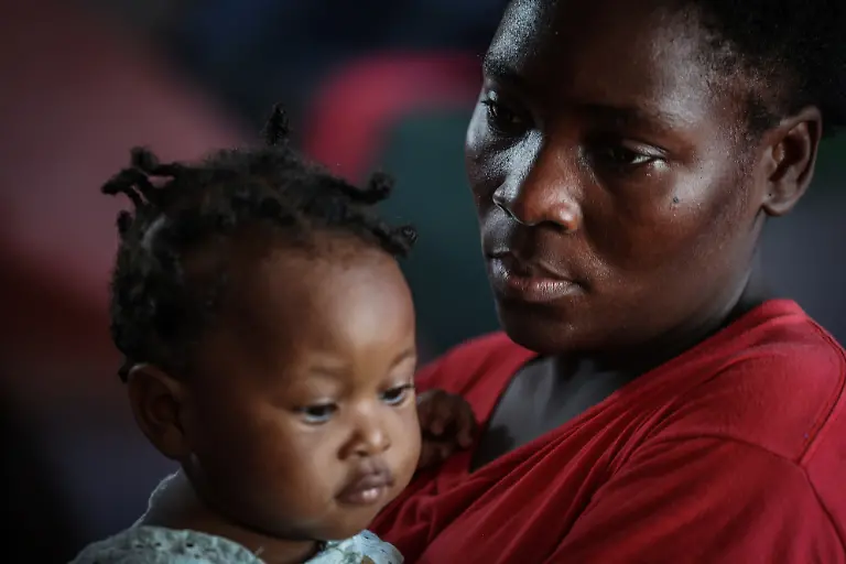 2024-07-03T130045Z-536636427-RC2EK7AX0AUU-RTRMADP-3-HAITI-VIOLENCE-HUNGER