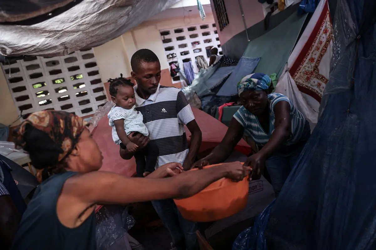 2024-07-03T130125Z-1524223622-RC2EK7AQOFLZ-RTRMADP-3-HAITI-VIOLENCE-HUNGER