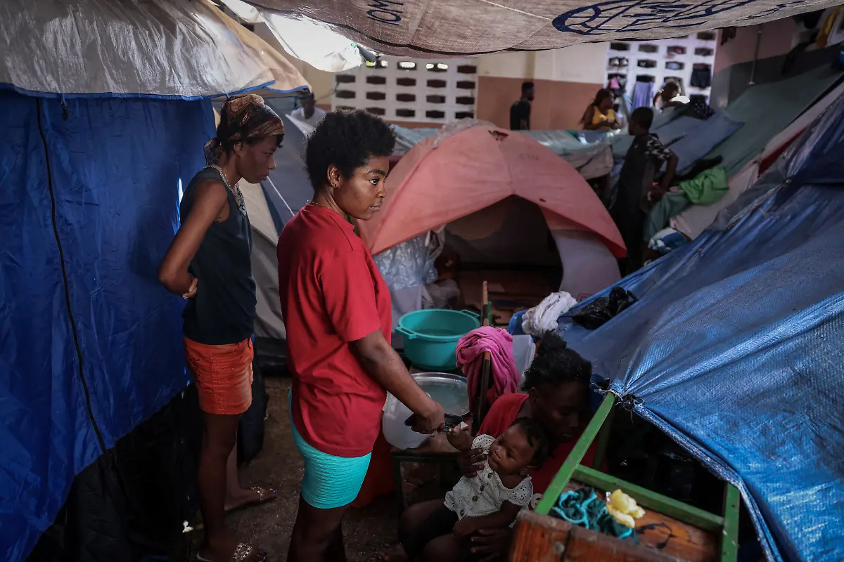 2024-07-03T130101Z-1290431706-RC2EK7AHQOYB-RTRMADP-3-HAITI-VIOLENCE-HUNGER