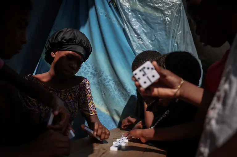 2024-07-03T130029Z-210885526-RC2FK7AJ3H7L-RTRMADP-3-HAITI-VIOLENCE-HUNGER