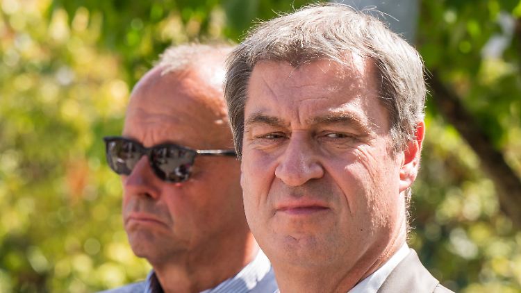 Vor dem Atomkraftwerk Isar II demonstriert die Union Einigkeit.