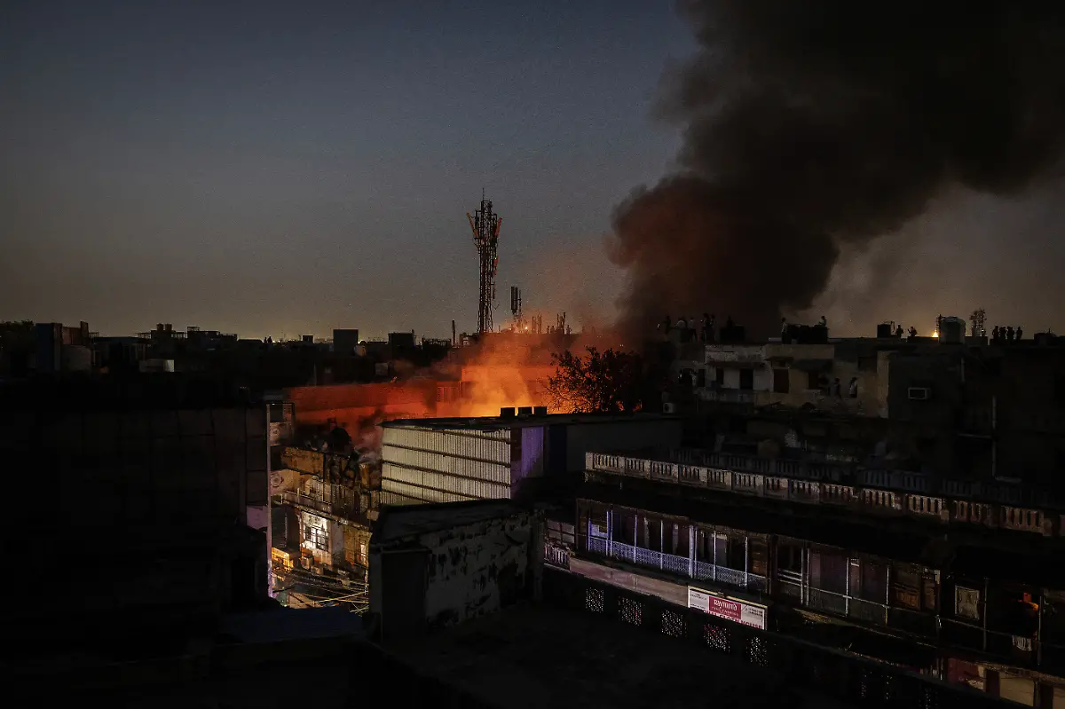 2024-06-27T100409Z-724285384-RC2EA8AGZF4L-RTRMADP-3-ASIA-WEATHER-INDIA-FIRES