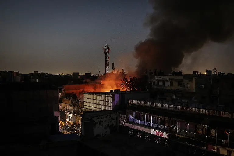 2024-06-27T100409Z-724285384-RC2EA8AGZF4L-RTRMADP-3-ASIA-WEATHER-INDIA-FIRES