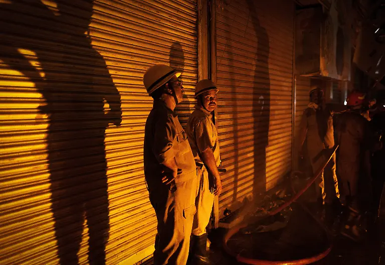 2024-06-27T100430Z-2068743882-RC2FA8AB97CU-RTRMADP-3-ASIA-WEATHER-INDIA-FIRES