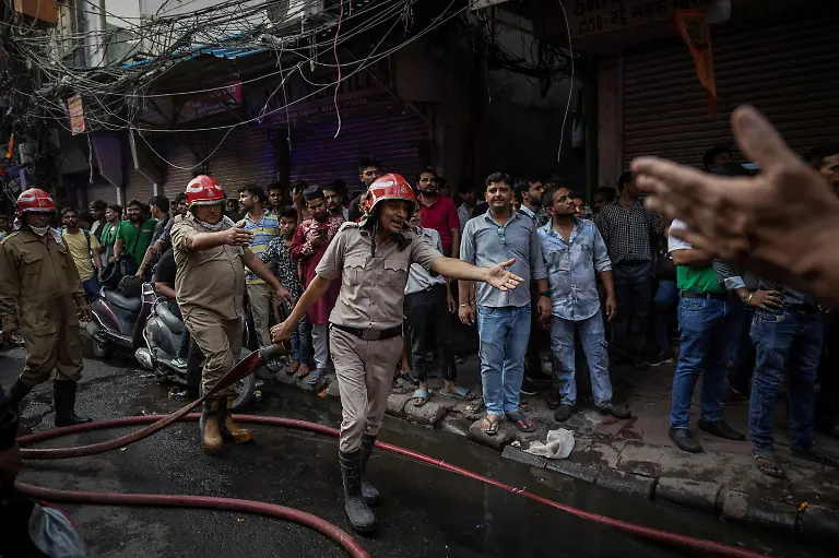 2024-06-27T100437Z-1218345957-RC2DA8AGCGED-RTRMADP-3-ASIA-WEATHER-INDIA-FIRES