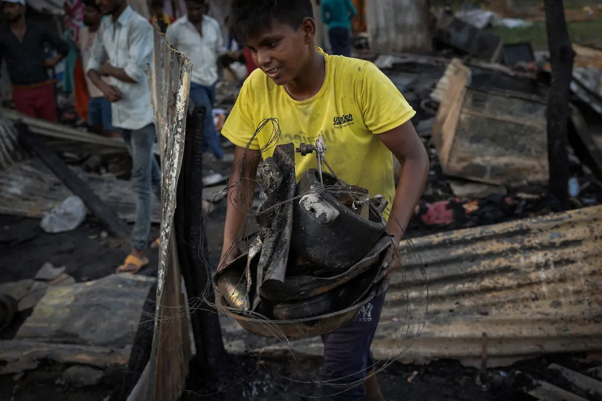 2024-06-27T100451Z-1206143145-RC2DE8ASLTDP-RTRMADP-3-ASIA-WEATHER-INDIA-FIRES