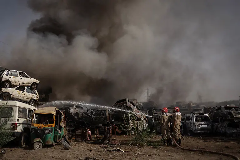 2024-06-27T100452Z-1998990293-RC2Y08A70X6J-RTRMADP-3-ASIA-WEATHER-INDIA-FIRES