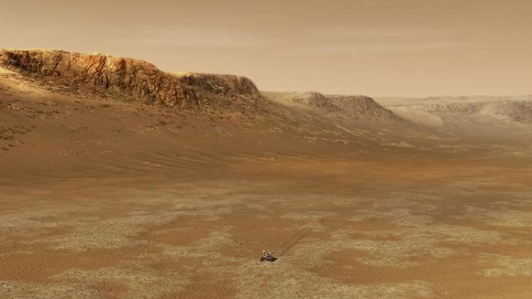 Illustration des NASA-Rovers "Perseverance" bei der Erkundung des Jezero-Kraters auf dem Mars. Ein Hauptziel der Mission von "Perseverance" ist die Astrobiologie einschließlich der Suche nach Anzeichen früheren mikrobiellen Lebens. 