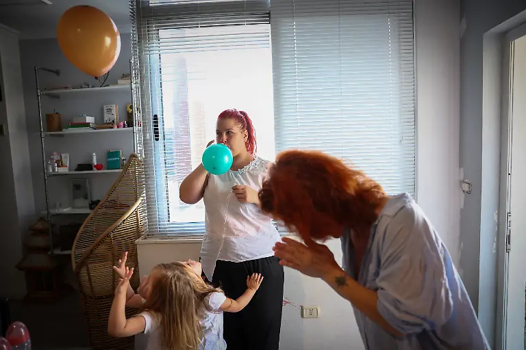 2024-06-03T081230Z-504201911-RC2WS7ATW4NE-RTRMADP-3-ALBANIA-LGBT-FAMILY