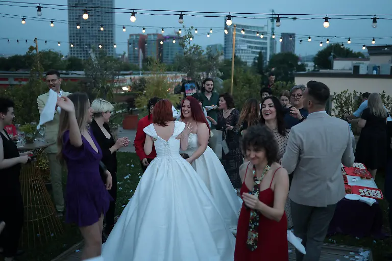 2024-06-03T081228Z-1755692135-RC2UT7AQ6K4U-RTRMADP-3-ALBANIA-LGBT-FAMILY