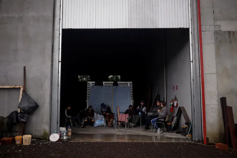 2024-05-29T100252Z-2057092549-RC2UN7A8ASHF-RTRMADP-3-BRAZIL-RAINS-FARMERS