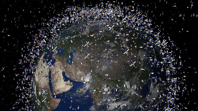 Das computergenerierte Bild der ESA zeigt Weltraummüll früherer Weltraummissionen, der neben intakten Satelliten um die Erde kreist