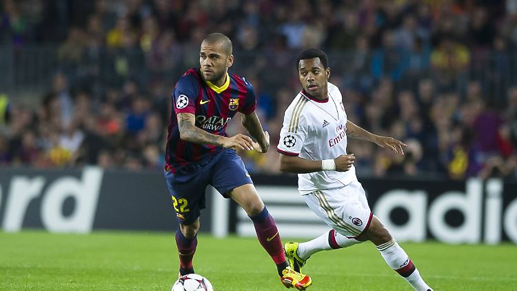Dani Alves (l.) und Robinho bei einem Spiel der Champions League im Jahr 2013. 