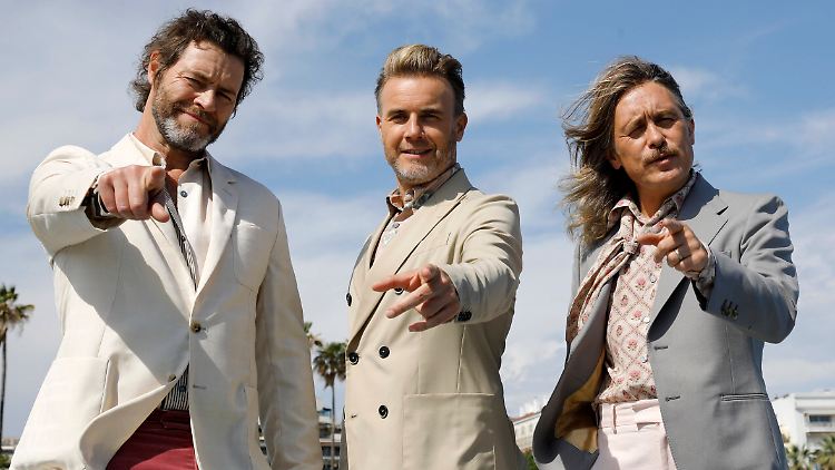 Gary Barlow, Mark Owen und Howard Donald sollen als Take That performen. 