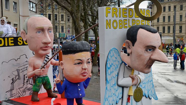 2016 wurden Putin, Kim und Assad, hier mit langer Lügennase, beim Kölner Rosenmontagsumzug dargestellt. 
