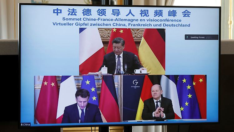 Im März 2022 haben sich Xi Jinping, Emmanuel Macron und Olaf Scholz digital ausgetauscht.