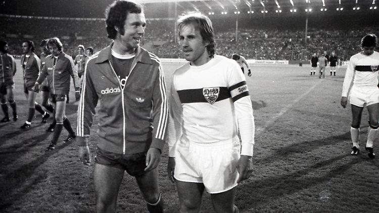 Ettmayer (rechts) im Gespräch mit Franz Beckenbauer.