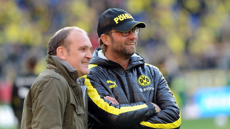 Jörg Schmadtke (links) und Jürgen Klopp gehen nun beim FC Liverpool gemeinsame Wege.