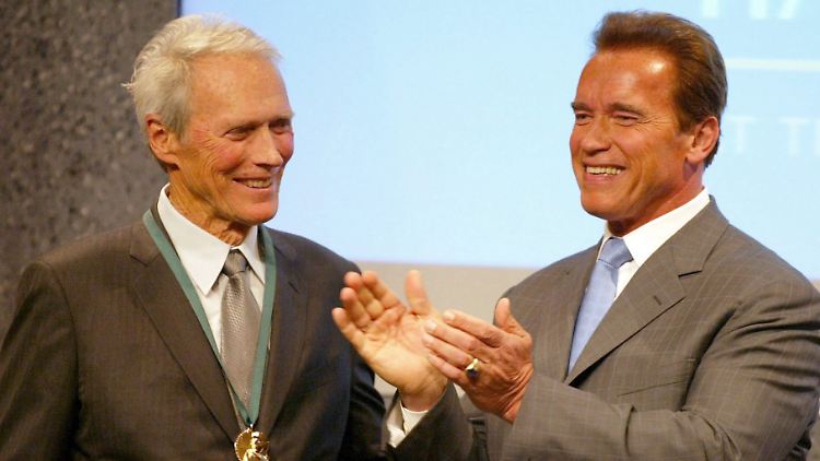 Sie kennen sich, sie mögen sich: Clint Eastwood (l.) und Arnold Schwarzenegger.