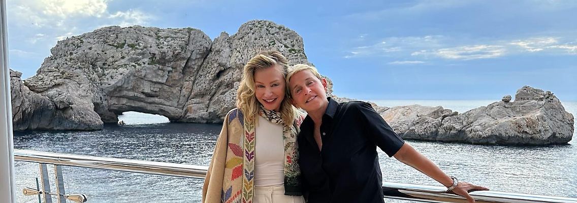 Photo by Ellen DeGeneres on August 16, 2023. May be an image of 2 people, people kissing, ocean and Durdle Door..jpg