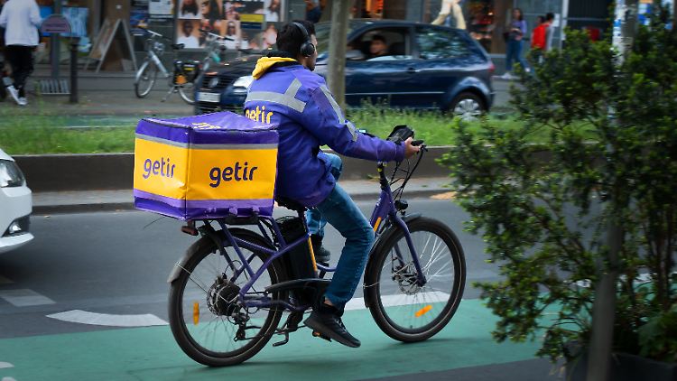 In großen deutschen Städten gehören die Fahrer von Getir fest zum Straßenbild.