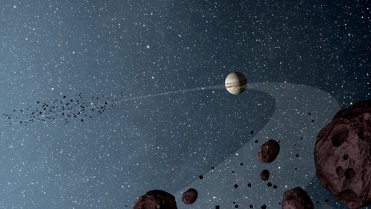 Diese künstlerische Darstellung basierend auf Daten einer NASA-Studie aus dem Jahr 2012 soll  Jupiter-Trojaner zeigen. 