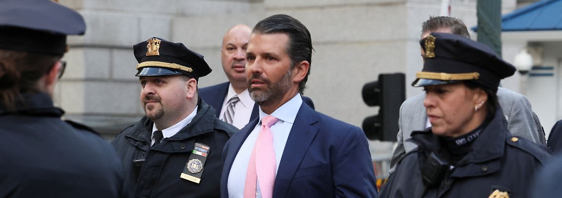 Umgeben von Polizisten: Donald Trump Jr. soll gemeinsam mit seiner Familie über Jahre die Vermögenswerte aufgebläht haben.