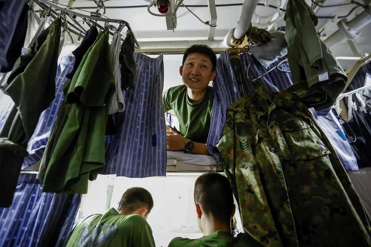 2024-01-10T230812Z-126529501-RC25E4A2DZ9B-RTRMADP-3-JAPAN-DEFENCE-WOMEN