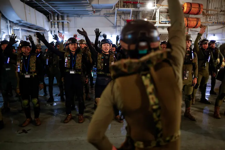 2024-01-10T230734Z-1301466286-RC2LD4AHH4B3-RTRMADP-3-JAPAN-DEFENCE-WOMEN