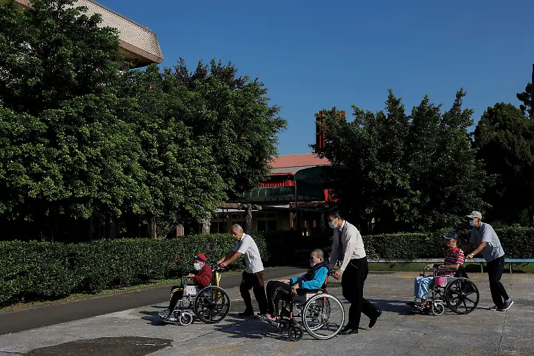 2023-12-14T044748Z-193564675-RC2004ADRA7R-RTRMADP-3-TAIWAN-ELECTION-VETERANS