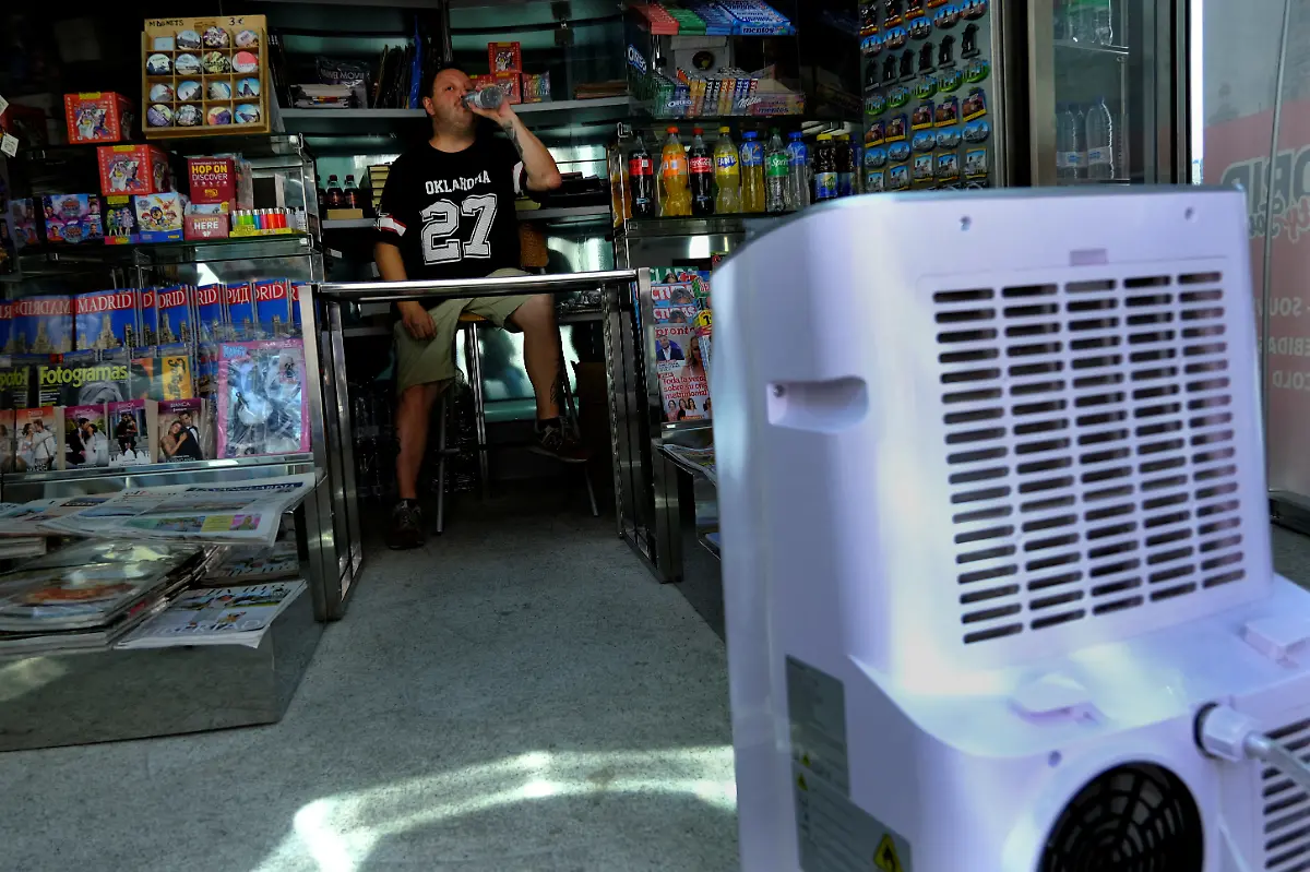 2023-12-05T030050Z-1675293799-RC2QJ2ATPHRC-RTRMADP-3-CLIMATE-UN-AIR-CONDITIONING