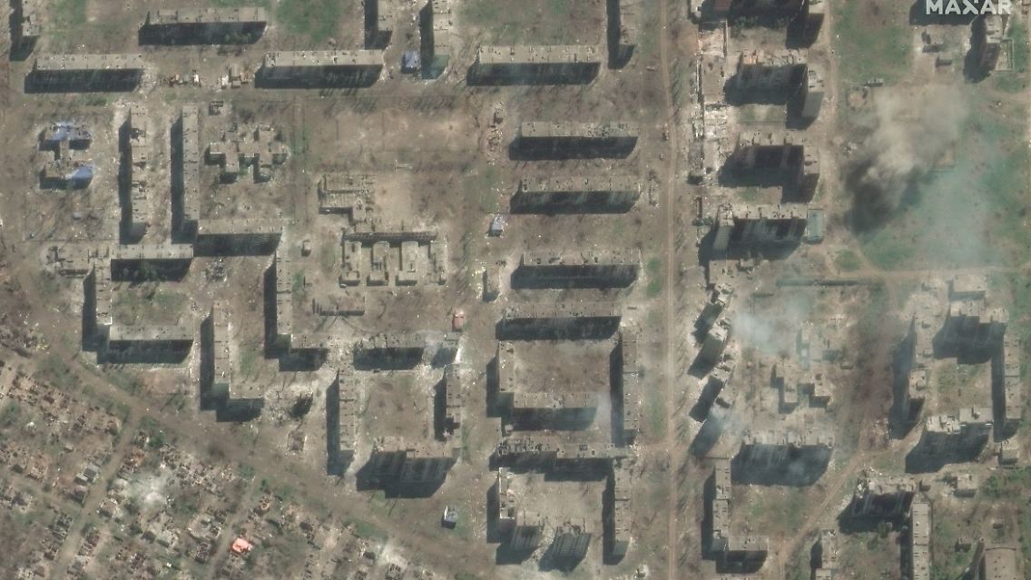 06_demolished bakhmut school and smoldering apartment buildings_15may2023_ge1.jpg