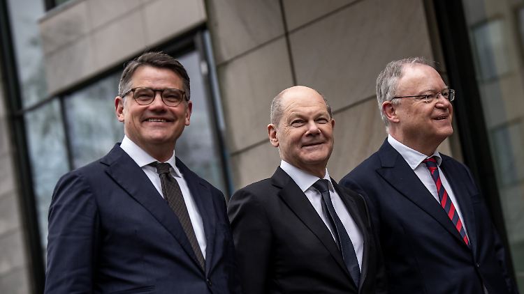 Drei mal ganz zufrieden: Rhein, Scholz und Weil.