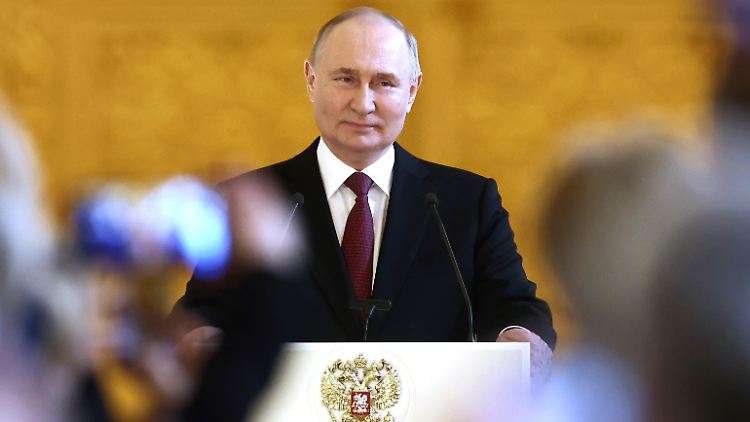 "Sieger"-Lächeln: Alter und neuer Präsident Russlands, Wladimir Putin.