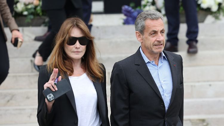 Unter Justizaufsicht: Carla Bruni und ihr Ehemann Nicolas Sarkozy. 