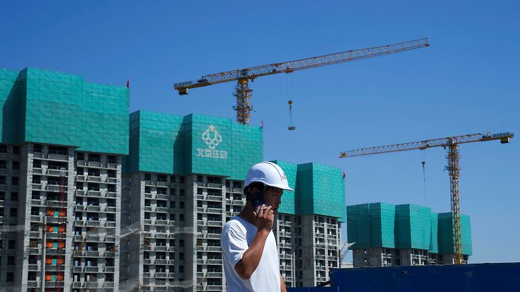 Niedrigere Kreditkosten sollen in China die Wirtschaft ankurbeln.