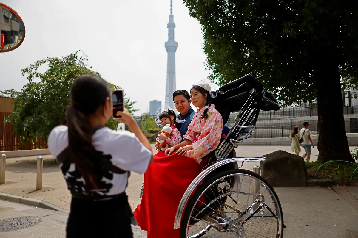 2023-09-25T230154Z-1243963615-RC2DL1AERIB6-RTRMADP-3-JAPAN-WOMEN-RICKSHAW