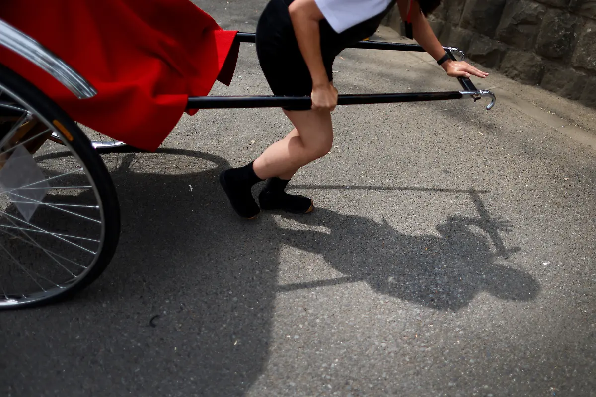 2023-09-25T230155Z-1949268897-RC2DL1A9CBKB-RTRMADP-3-JAPAN-WOMEN-RICKSHAW