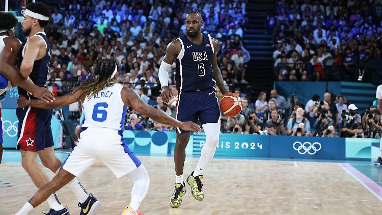 Goldene Schuhe, goldene Würfe: LeBron James und Co. holen olympisches Gold.