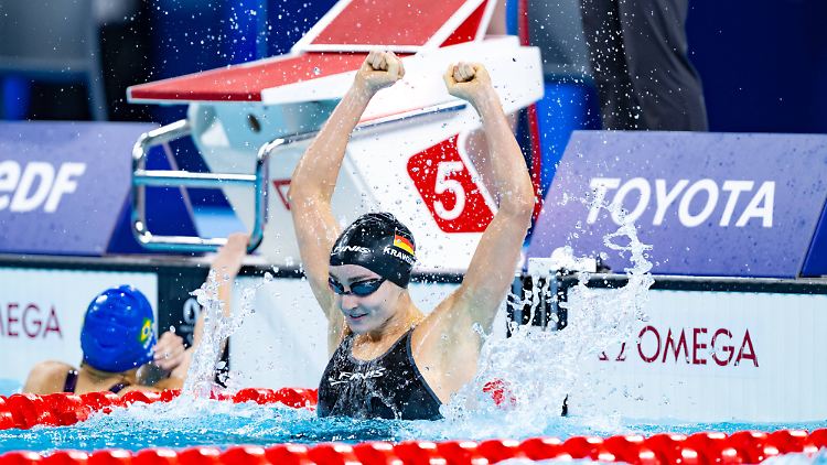 Elena Semechin schwamm in Weltrekordzeit zu Gold.