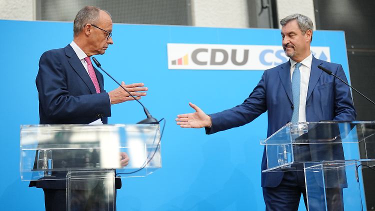 "Friedrich Merz macht's und ich bin fein damit", sagte Söder am Mittag in Berlin.
