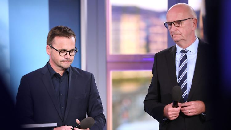 Redmanns (l.) CDU will zunächst nicht mit der SPD und Woidke über eine Regierungsbeteiligung sprechen.